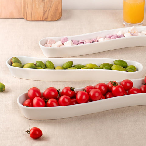 Dizada olive plates long arc shape enhances presentation for entertaining.