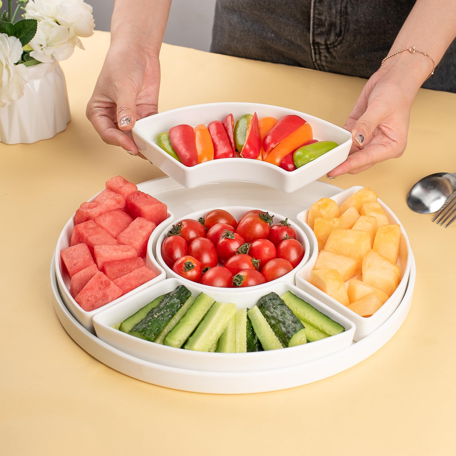Dizada olives nuts fruits display enhances party spread and guest choices.