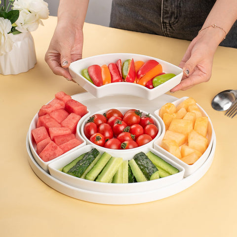 Dizada olives nuts fruits display enhances party spread and guest choices.