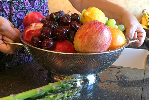 DLD stainless colander with solid ring base for stable draining.