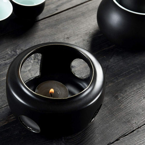 Dltsli warming mug holding warm sake to enhance tasting moments