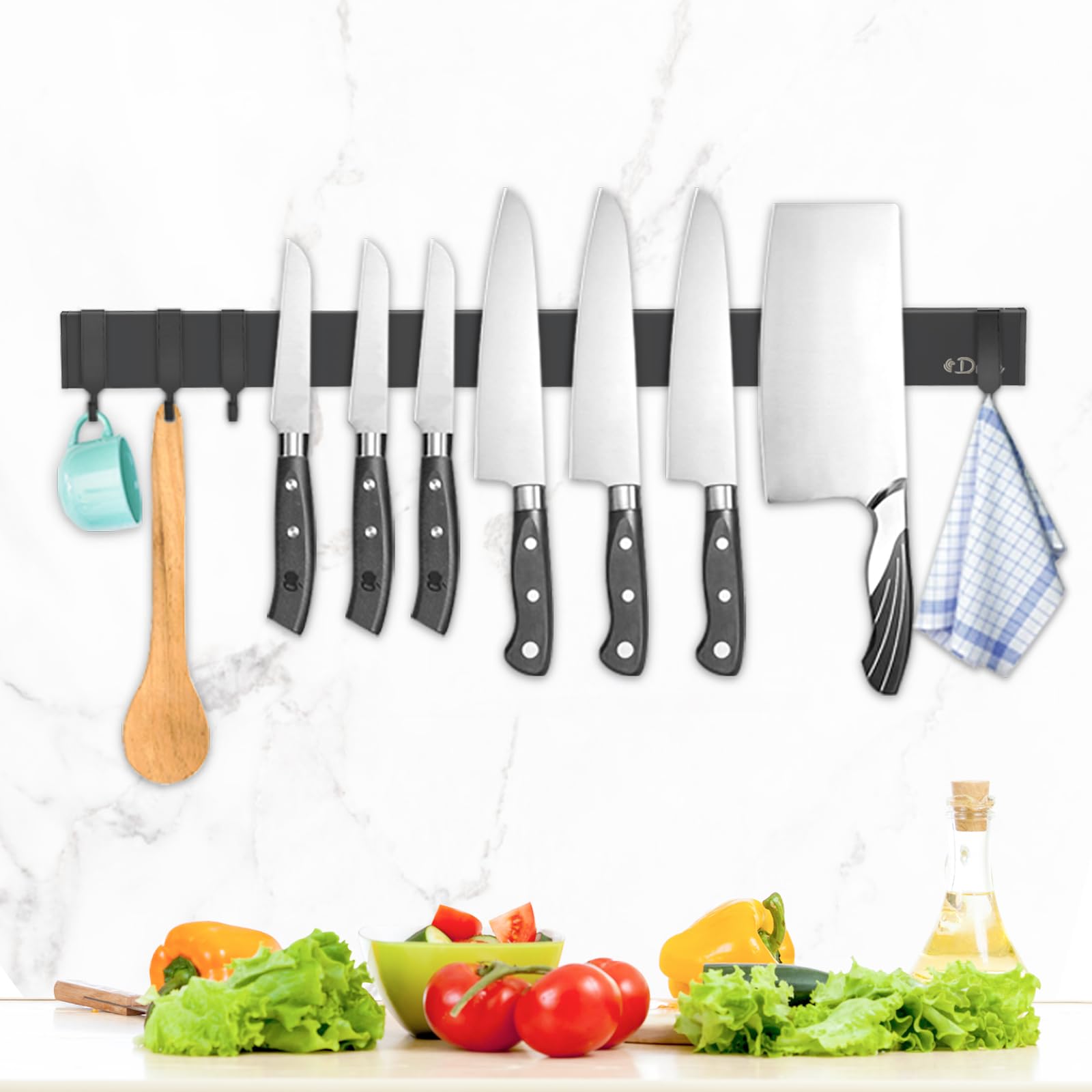 Dmore magnetic knife holder on wall with four hooks for easy access.