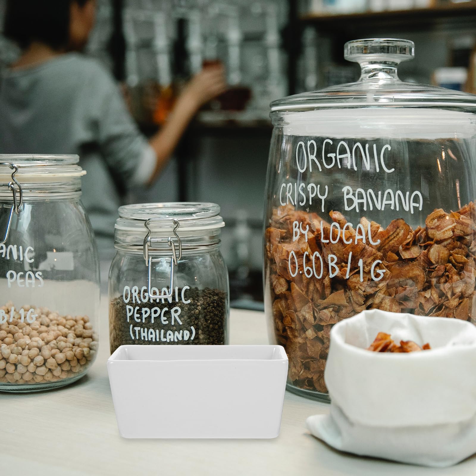 DOITOOL sugar packet dispenser in white adds quick access at tableside.