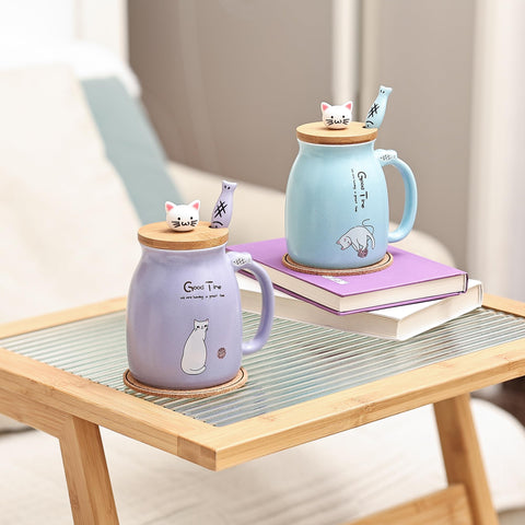 Close-up of the purple cat mug showing 3D design and glaze