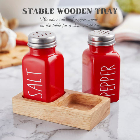Dopeca red shakers in wood tray keeping kitchen counter organized.