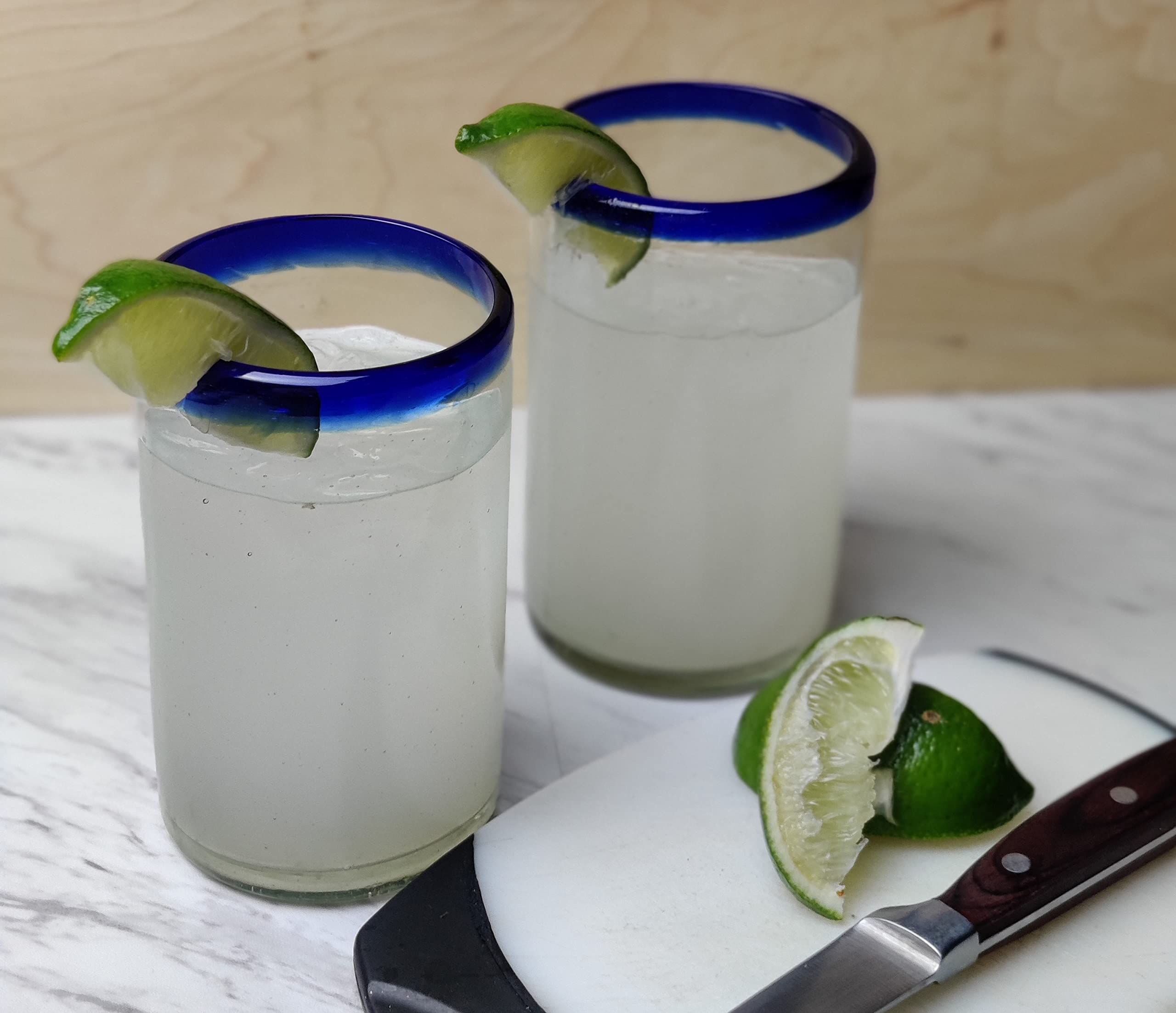 Dos Sueños blue rim glasses add vibrant table accents