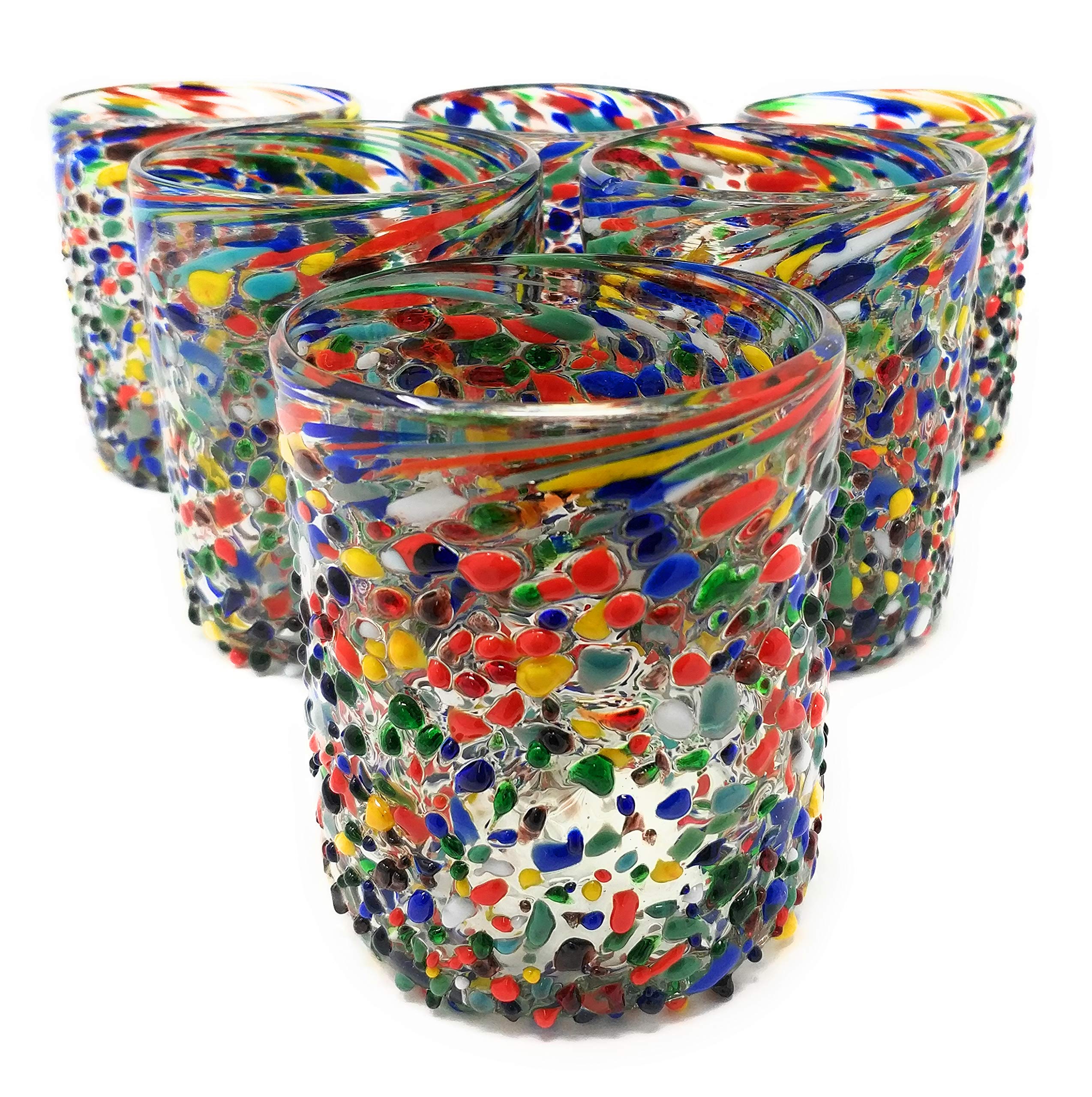Dos Sueños hand blown glass tumbler with confetti rock design for festive entertaining.
