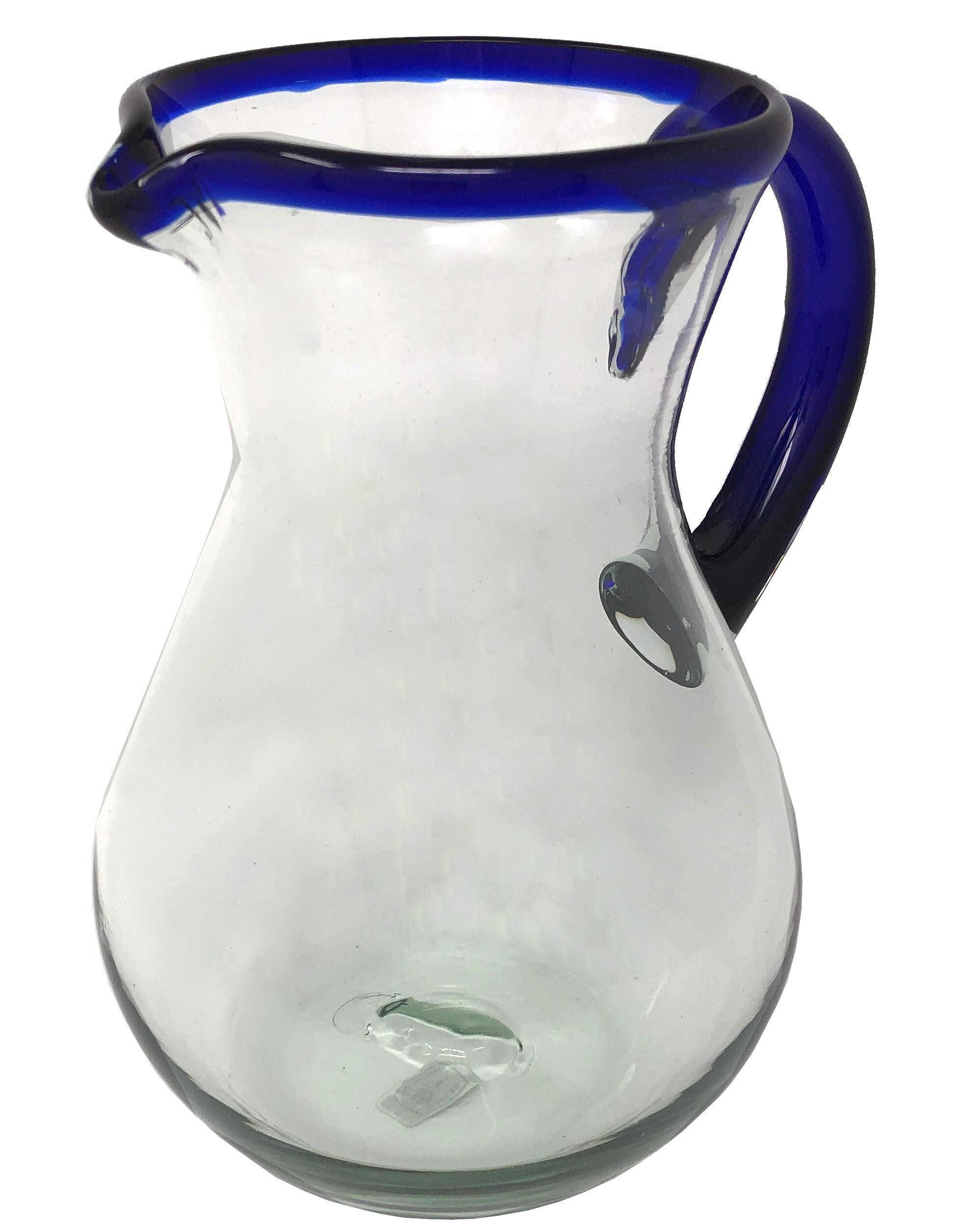 Dos Sueños pitcher front view with cobalt blue rim, ideal for elegant serving.