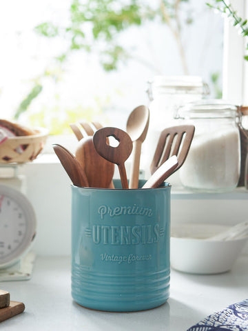 DOWAN ceramic utensil holder with protective cork mat guarding countertops