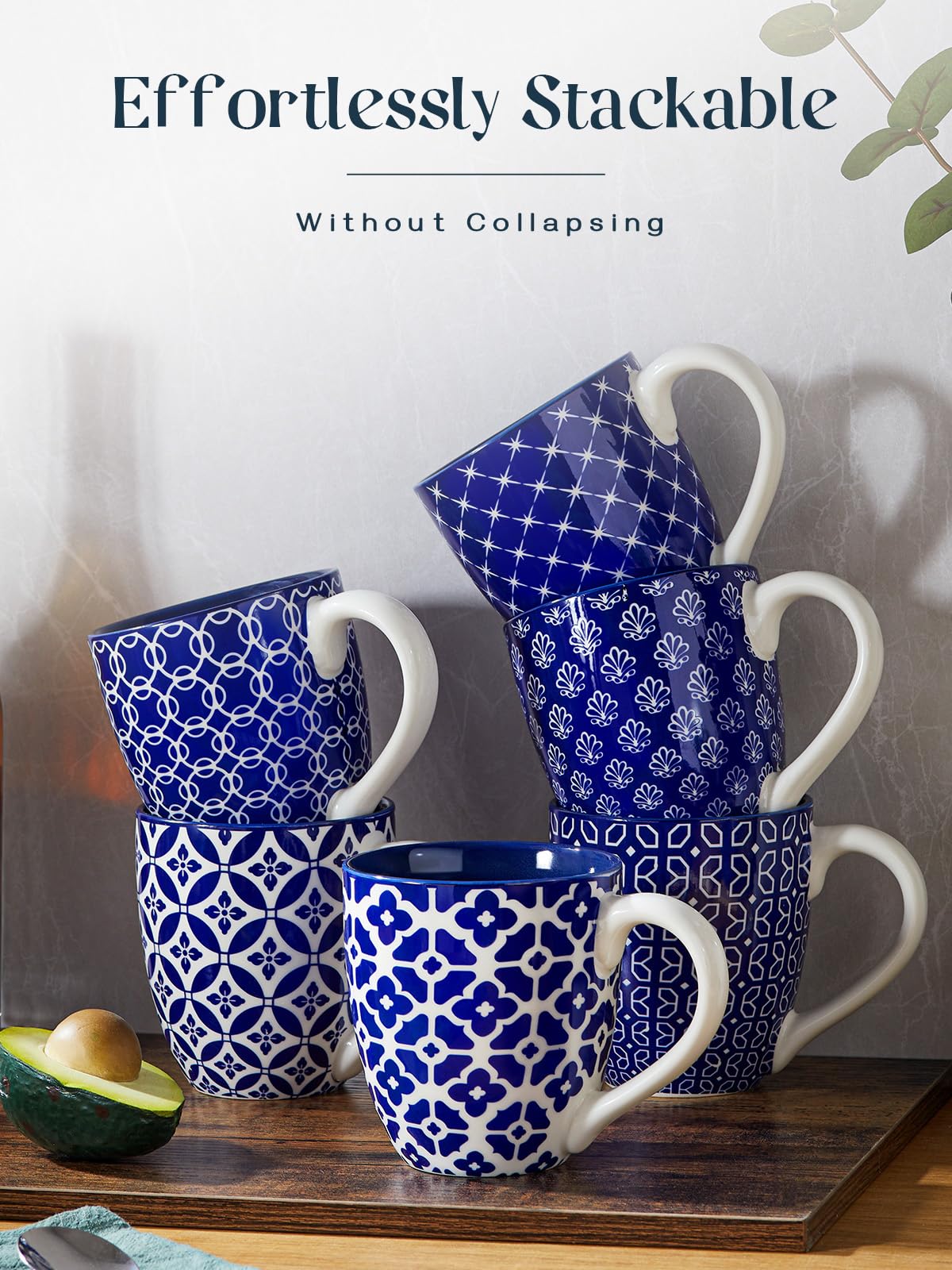 DOWAN mug shows weighted base, reduces tipping beside the computer.
