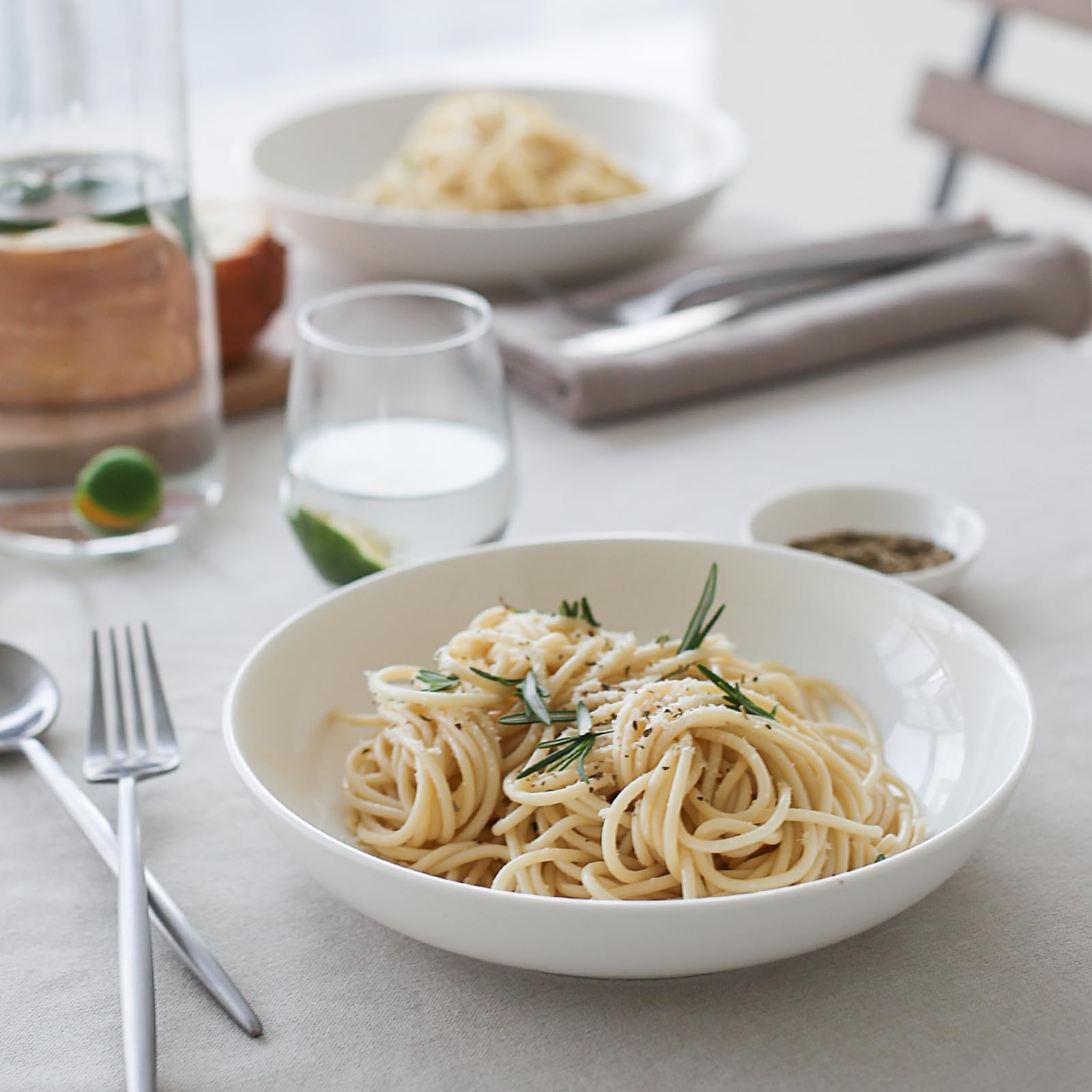 DOWAN soft white bowls complement colorful dishes and table settings