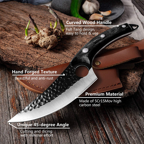 Dream Reach Huusk Viking Knife outdoors during camping tasks.
