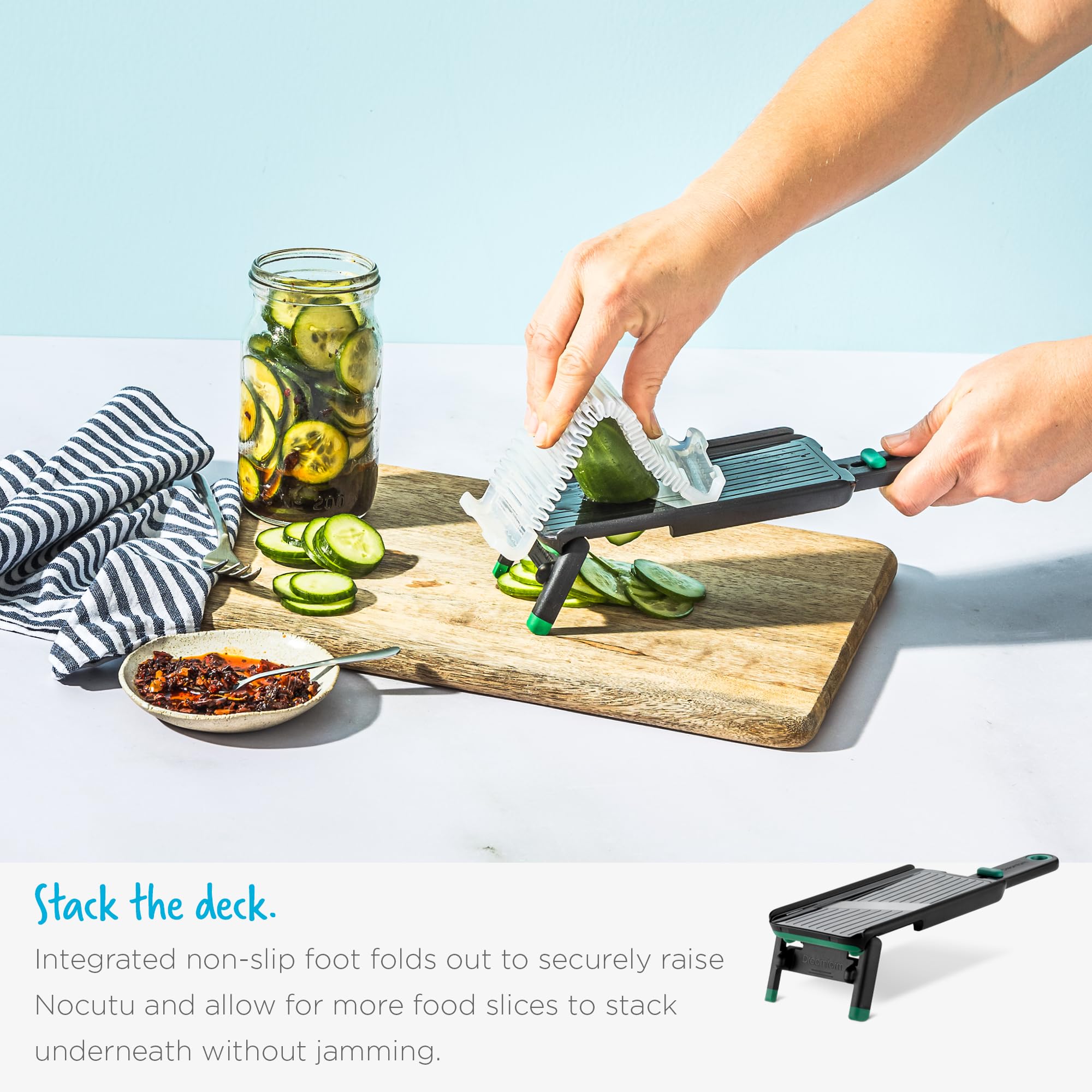 Dreamfarm Nocutu bowl-hook attachment clips onto bowls for secure stability.