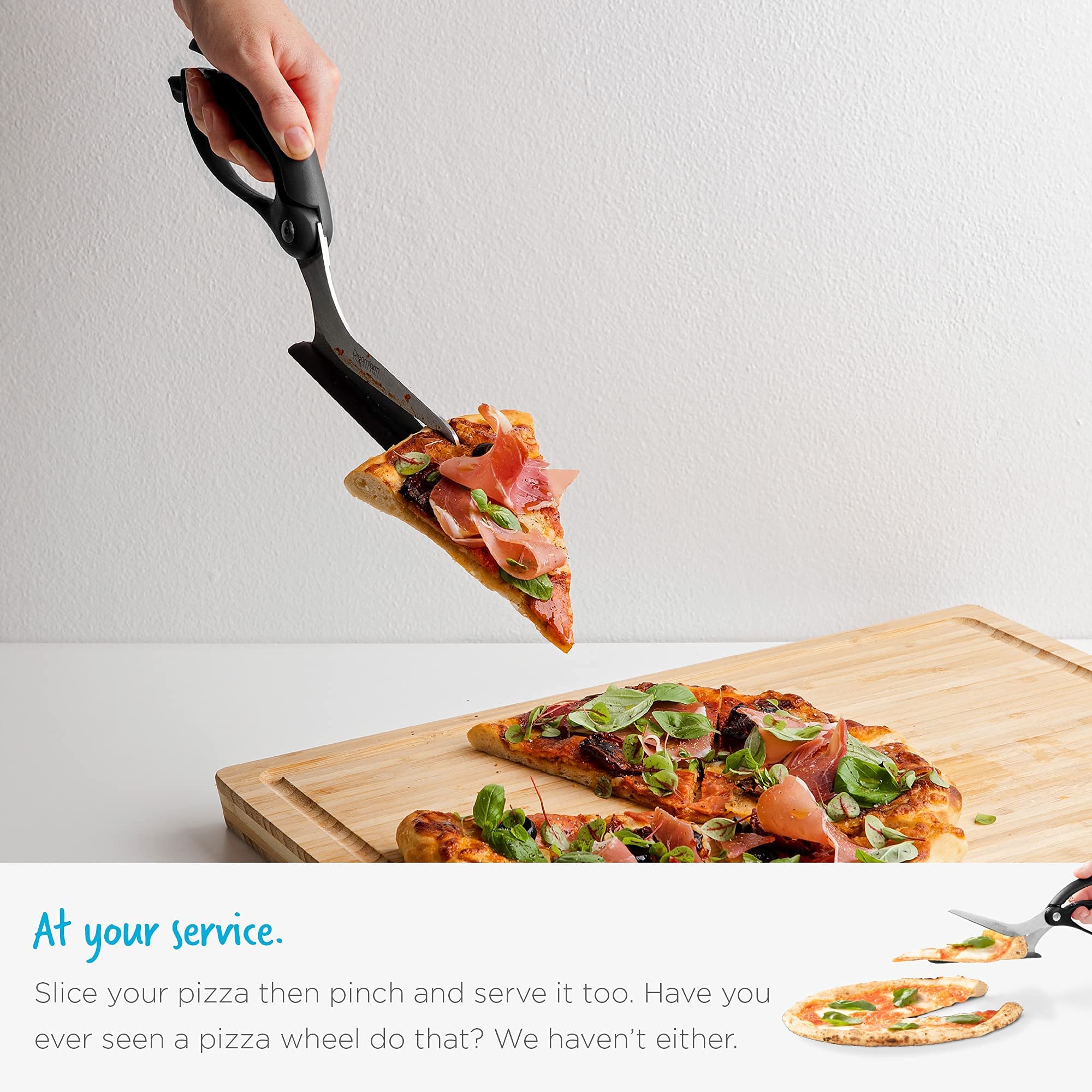 Dreamfarm Scizza spatula shoe server slides under pizza and serves slices