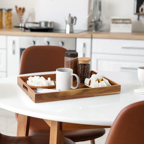 Dreamkey 17-inch acacia wood tray side view on ottoman, highlighting sturdy construction.