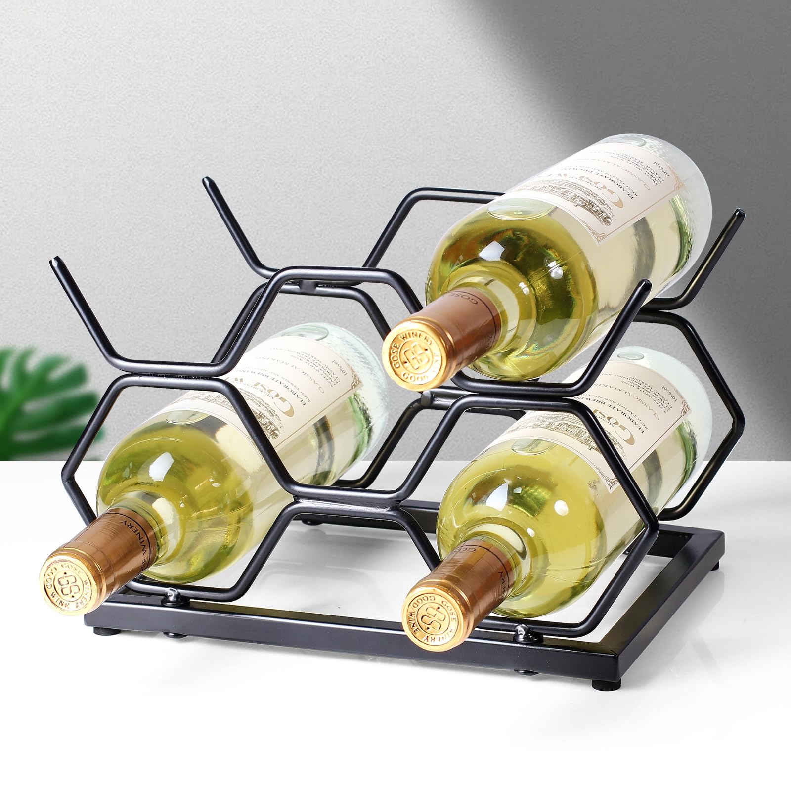 Drincarier gold metal wine rack stand adds elegant storage to any surface.