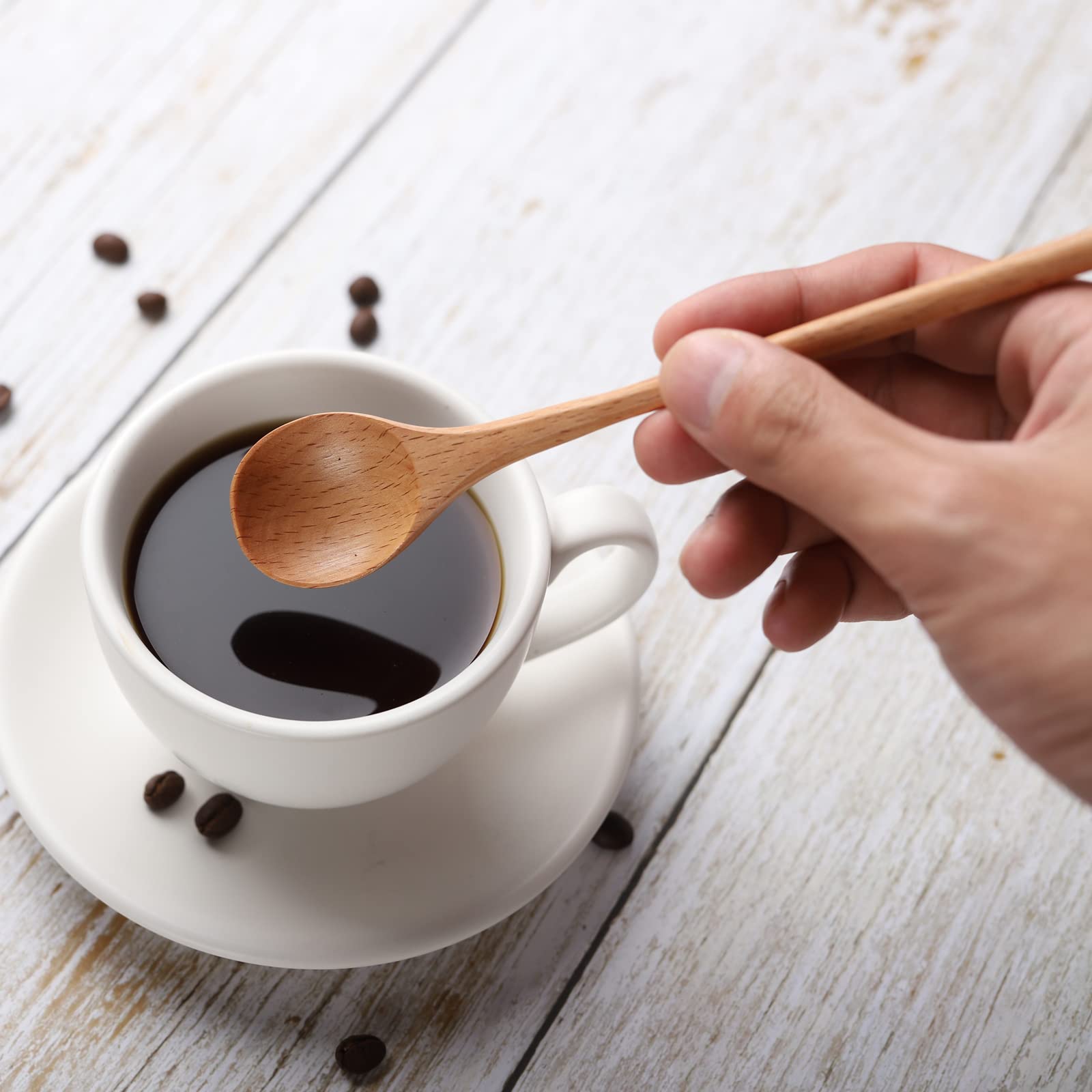 DROENTIL coffee-stirring-spoon-detail features sturdy wood for daily use.