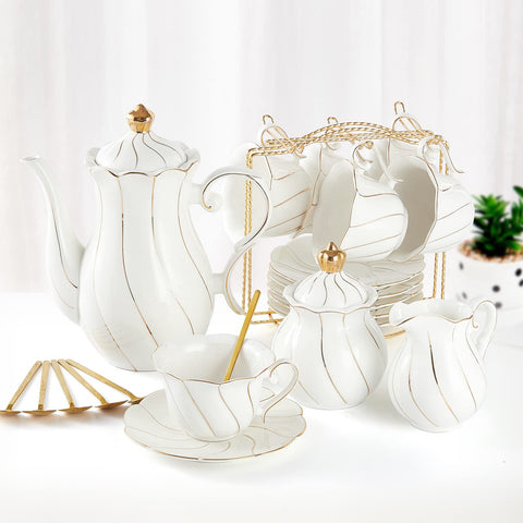 DUJUST teapot with golden trim, delivering an elegant serving experience.