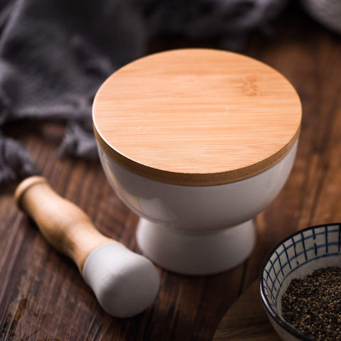 Dishwasher-safe mortar with recommendation to hand-wash the pestle.