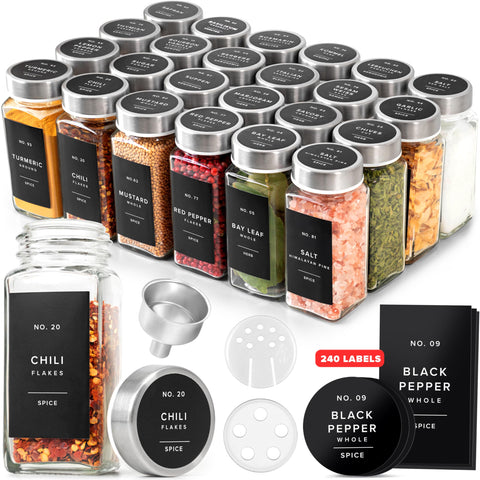 EDELHAUS glass spice jars with labels and steel lids arranged for organized pantry storage.