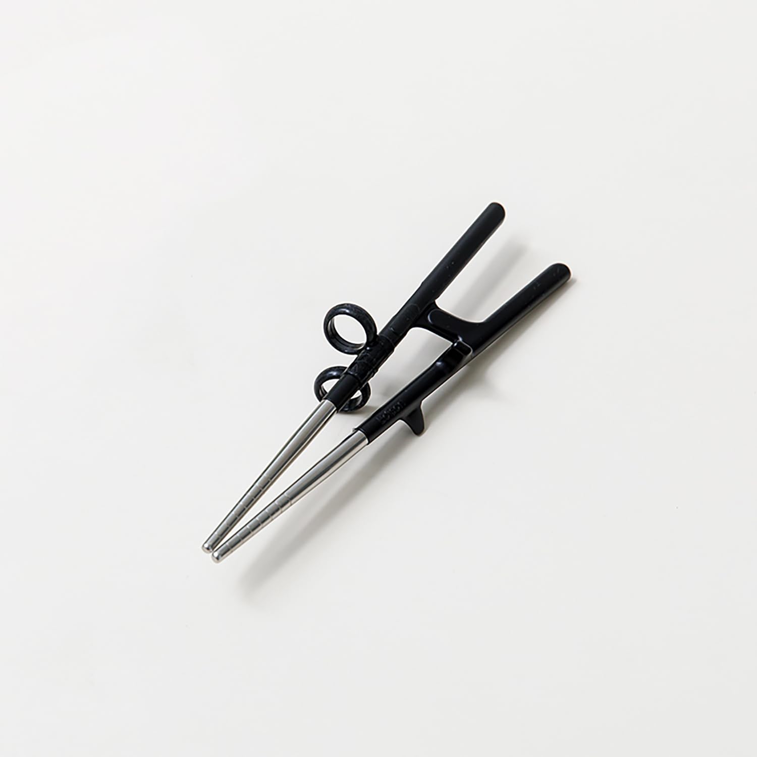 Edison Friends stainless trainer chopsticks help beginners learn control and comfort.