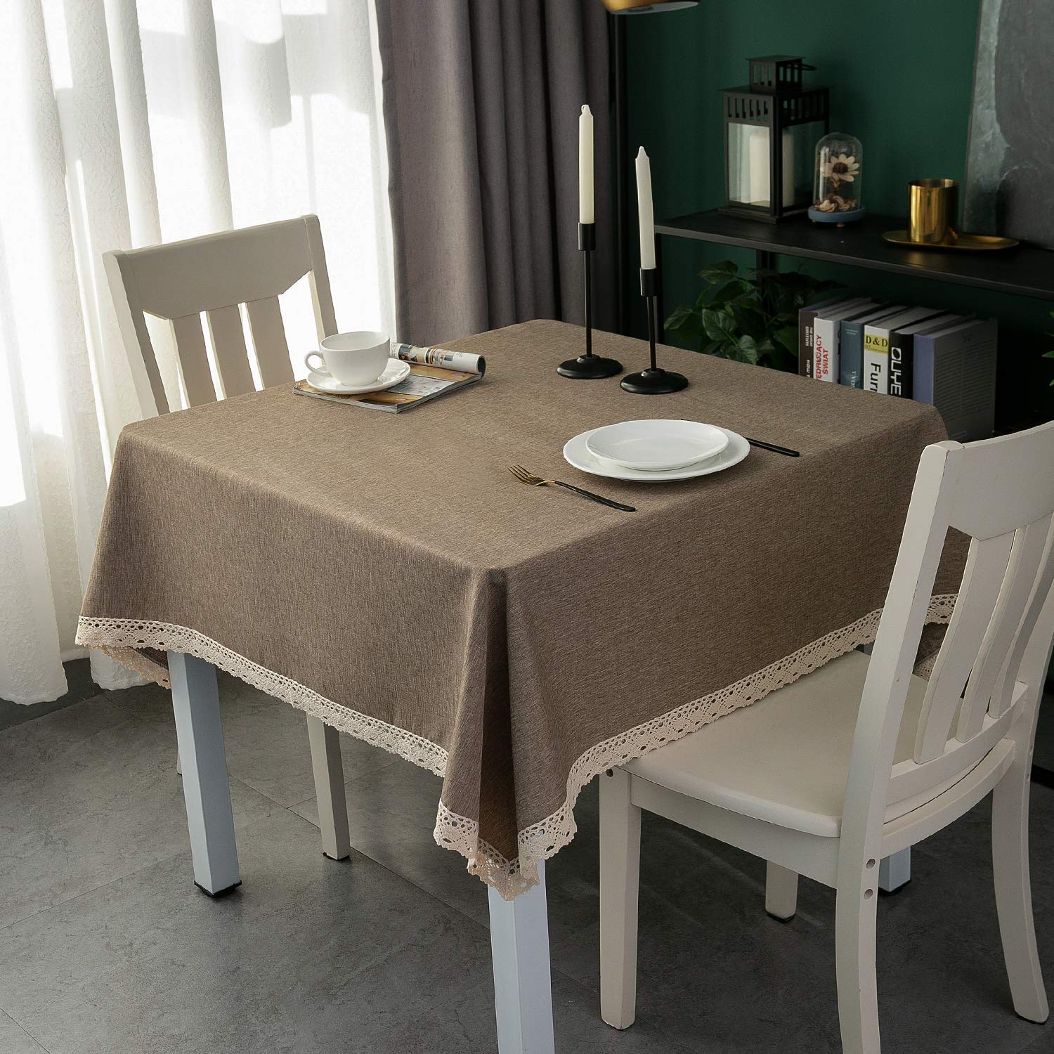 EHouseHome waterproof tablecloth protects surfaces from spills during meals and gatherings.