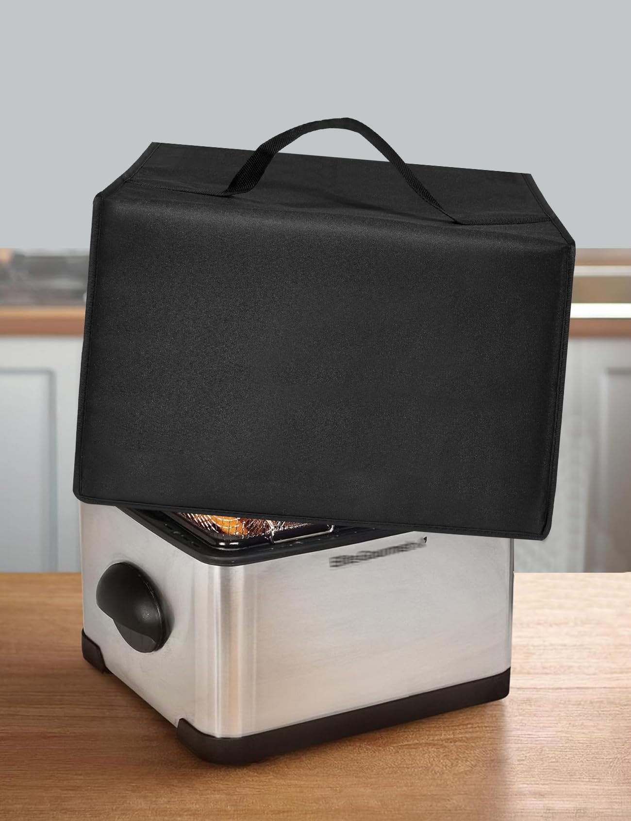 EiiJugaloo deep fryer cover top handle design for easy access.