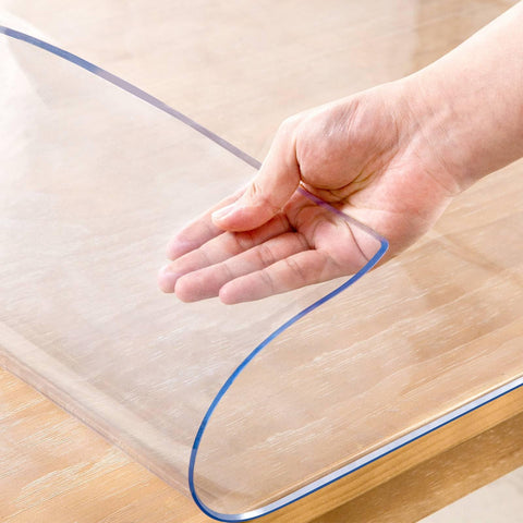 Eisdroma clear table cover 14x24 protects surfaces from spills and scratches.