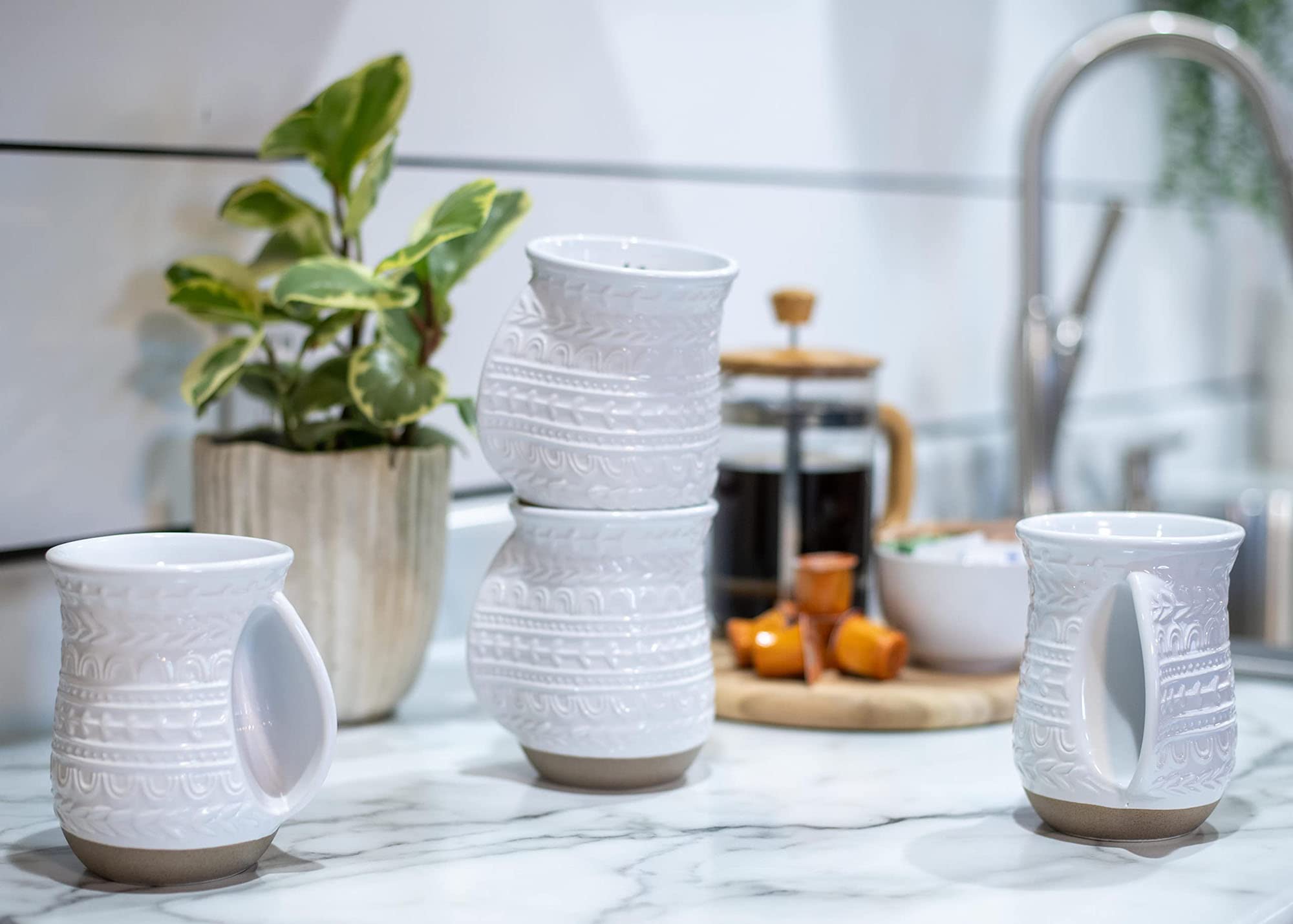 Microwave and top-rack dishwasher safe mugs for easy cleanup.