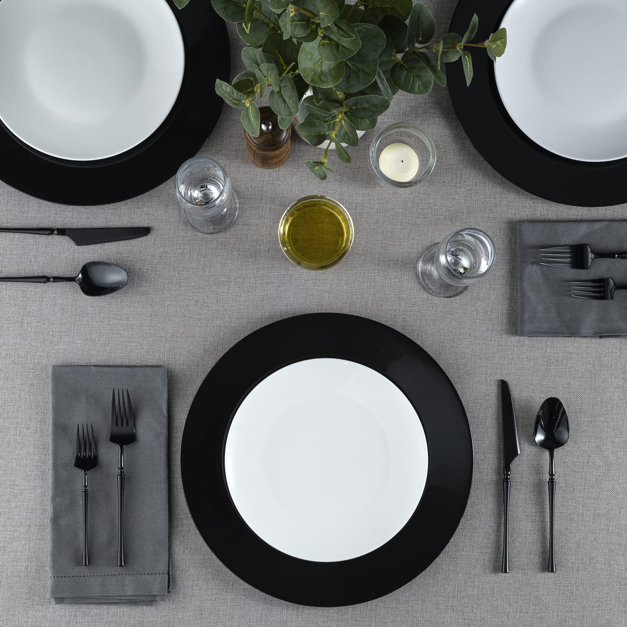 Elegant Disposables black platter serving image for versatile use as a serving platter and stylish display.