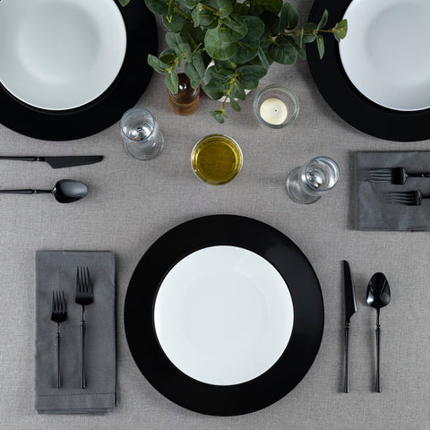 Elegant Disposables black platter serving image for versatile use as a serving platter and stylish display.