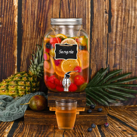 Eleganttime outdoor party buffet setup featuring glass beverage dispensers