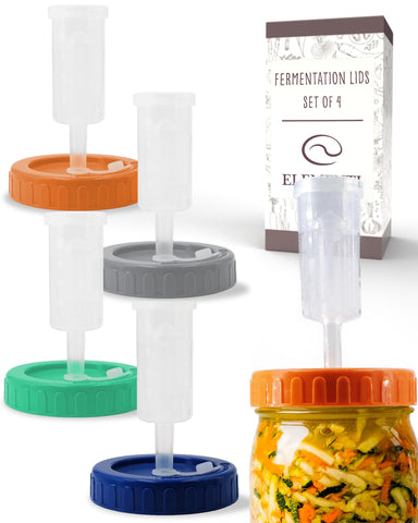 Elementi mason jar fermentation lids on a wide-mouth jar ensuring airtight sealing for fresh ferments