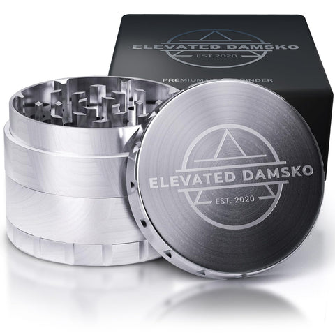 Elevated Damsko 2.5-inch stainless steel grinder on countertop for durable kitchen use