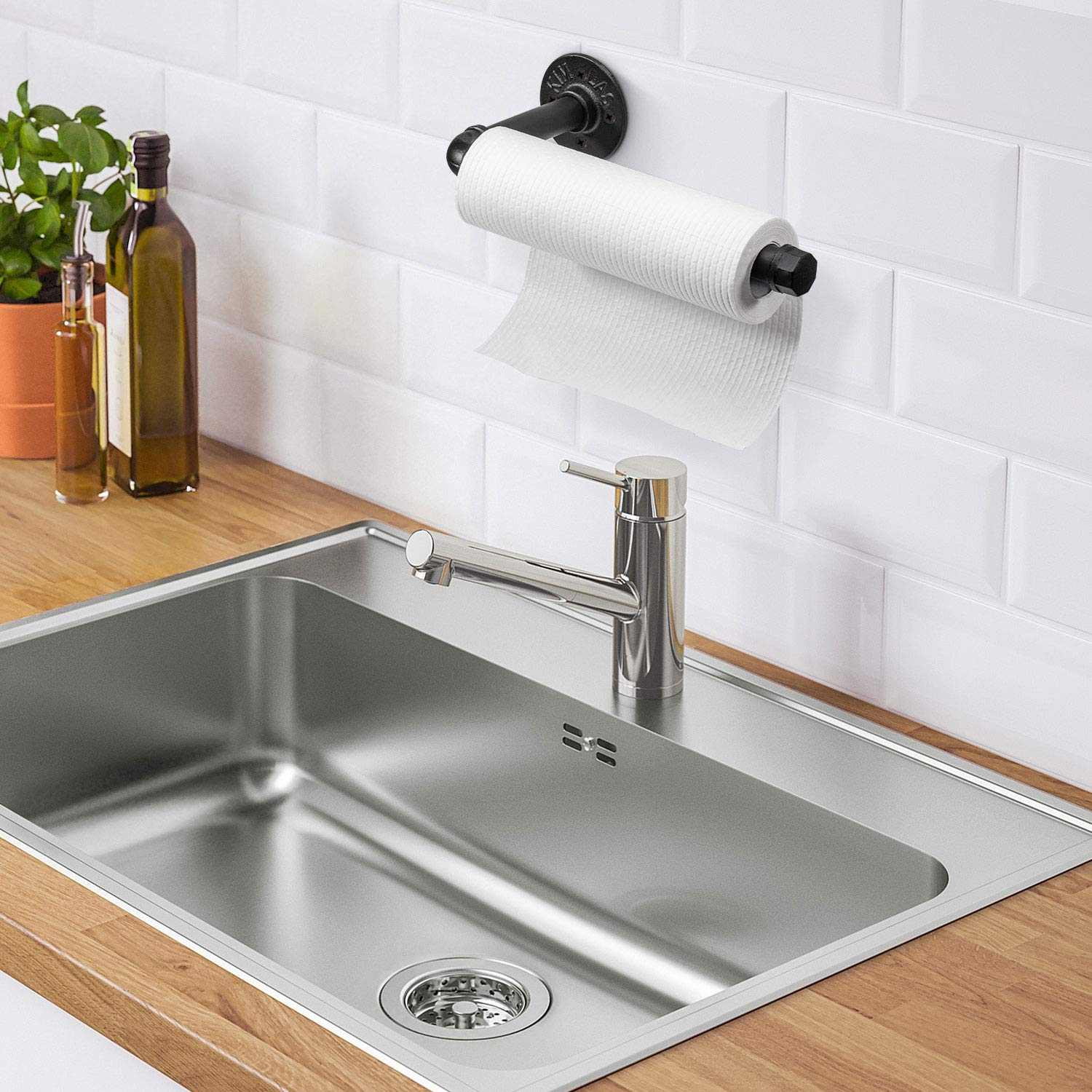 Elibbren handrail-style pipe holder, versatile beyond kitchen use.