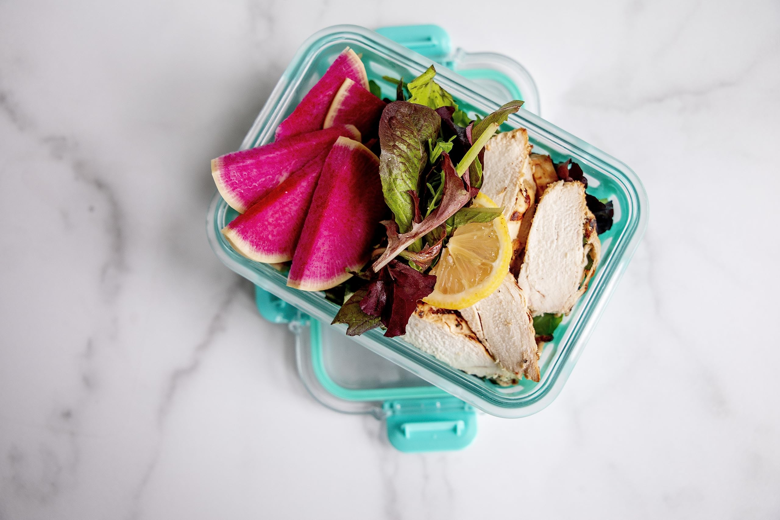 Ello Duraglass glass container keeps fridge organized and odors controlled