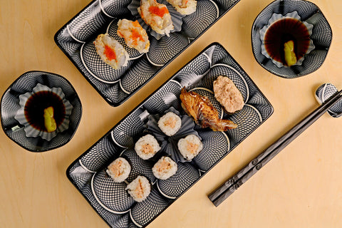 ELUSH ceramic sushi plate close-up shows glossy glaze and design details.