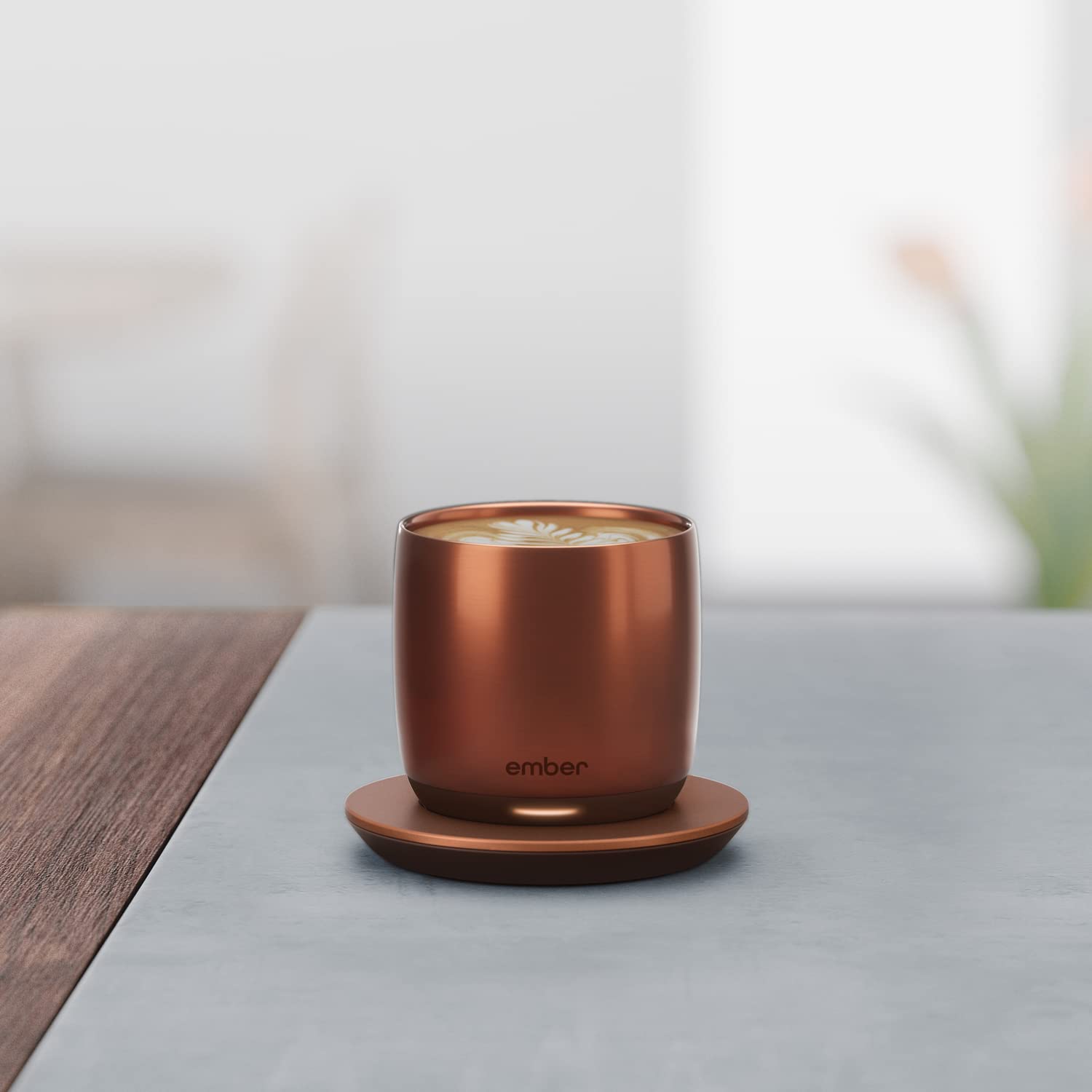 Ember Cup on charging coaster highlighting up to 90 minutes of heat.