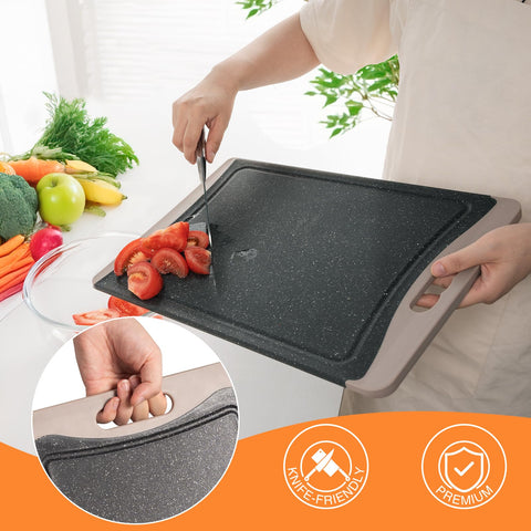 Empune medium cutting board in almond gray perfect for fruit slicing.