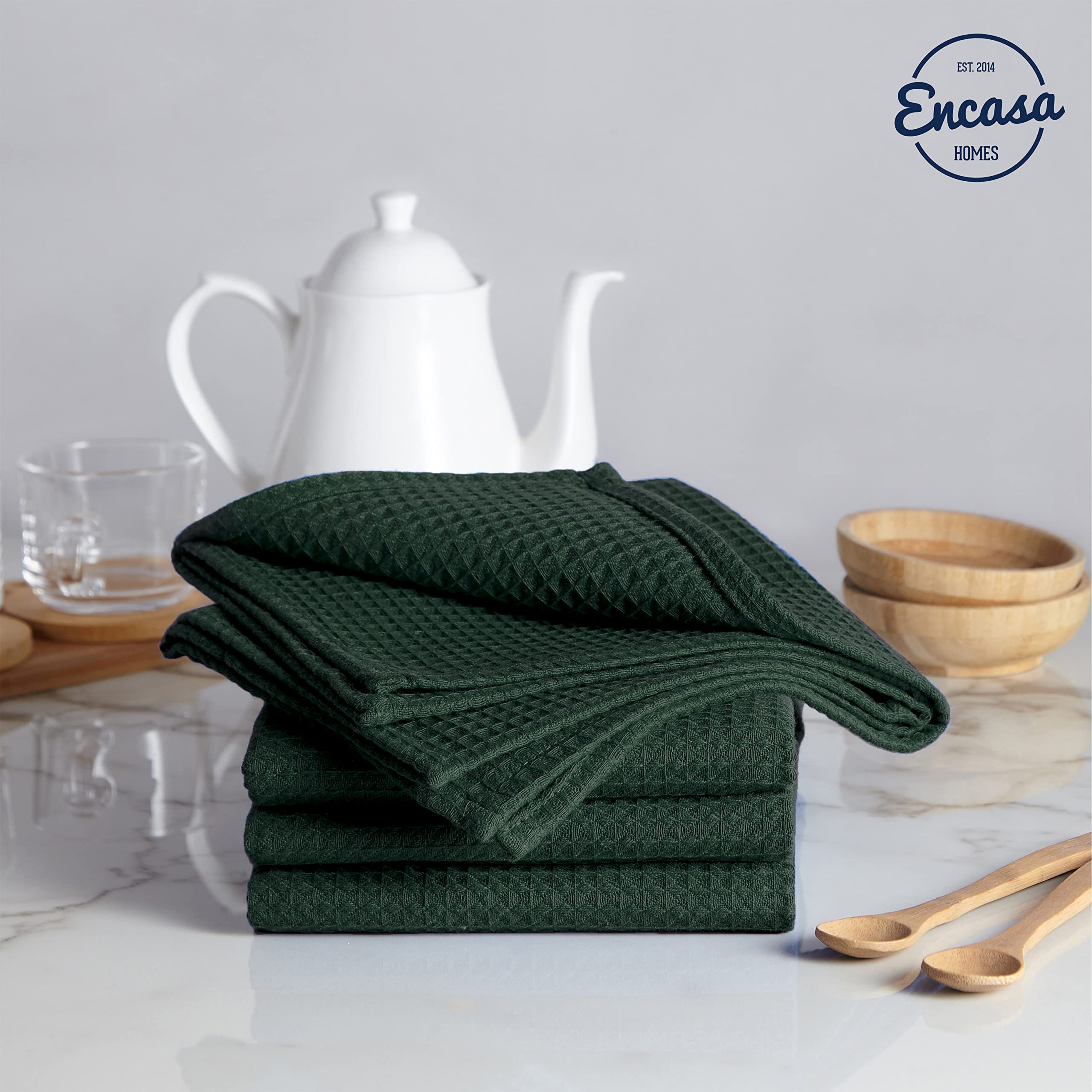 Encasa XO flat-hand towel in dark green for versatile drying and covering tasks