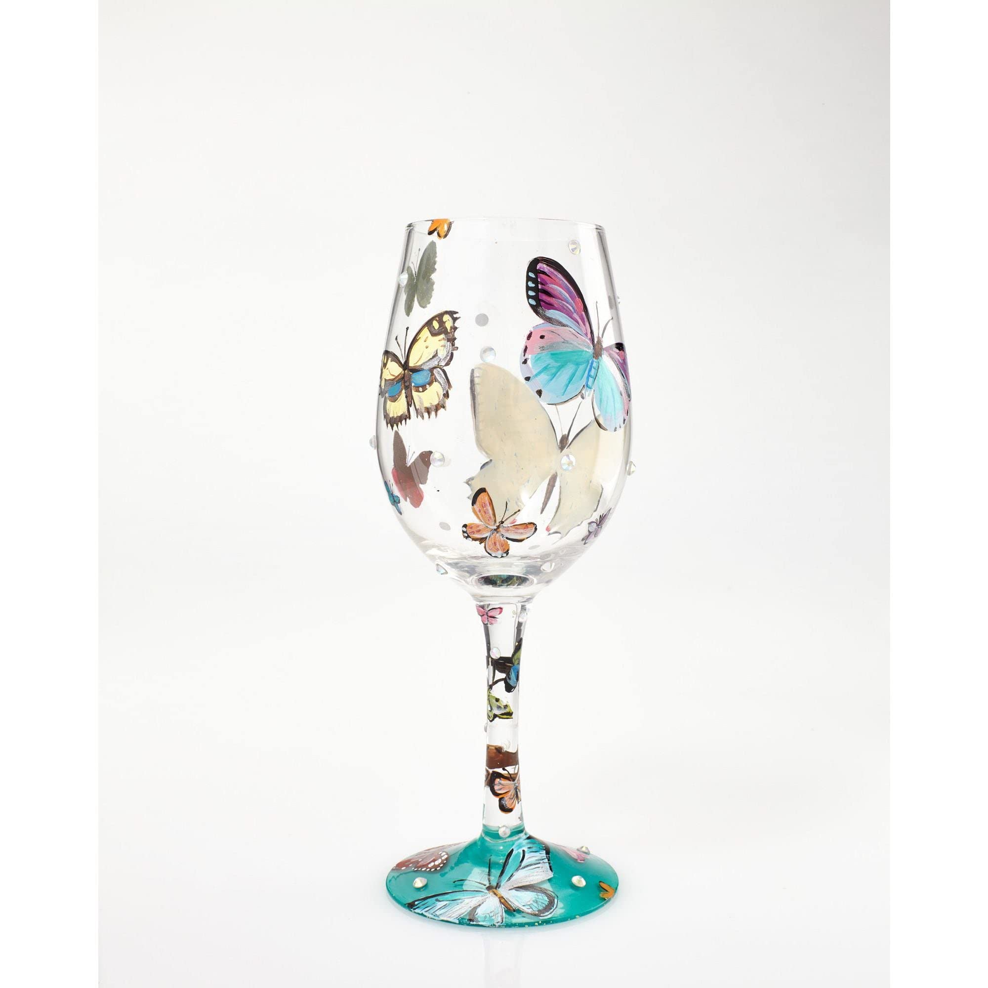 Enesco butterfly-pattern glass features an under-base cocktail recipe for playful mixing