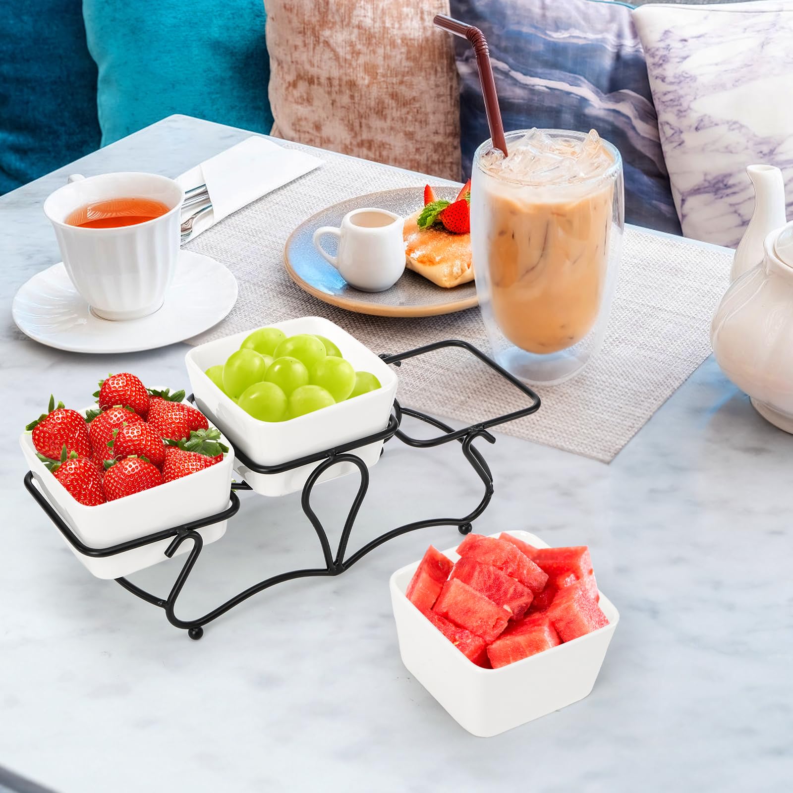 Eorbow kitchen counter display keeps desserts and appetizers organized.