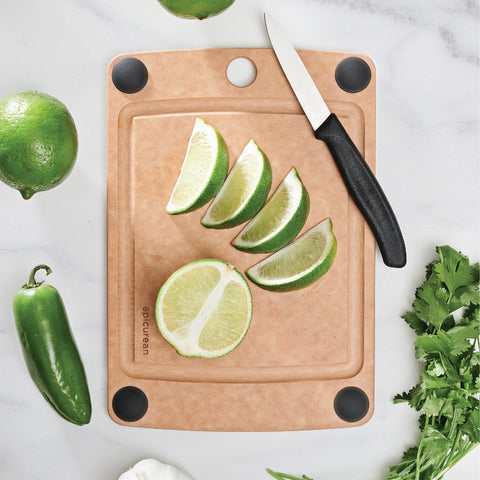 Epicurean board with non-slip feet stays stable during chopping.