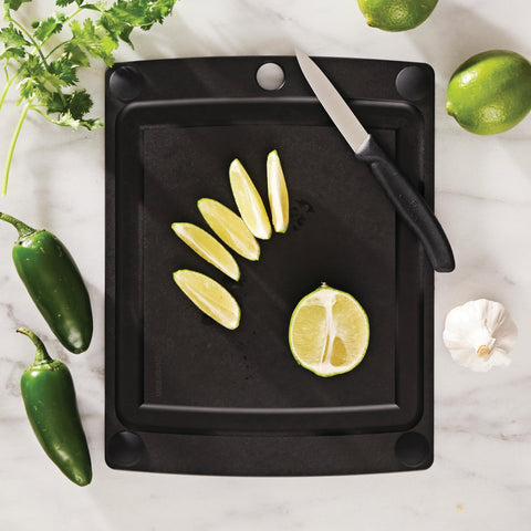 Epicurean cutting board with juice groove catching liquids for cleaner prep.
