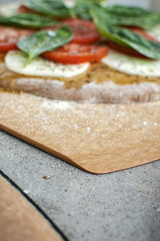 Epicurean pizza peel showing built-in hole for easy grabbing and storage