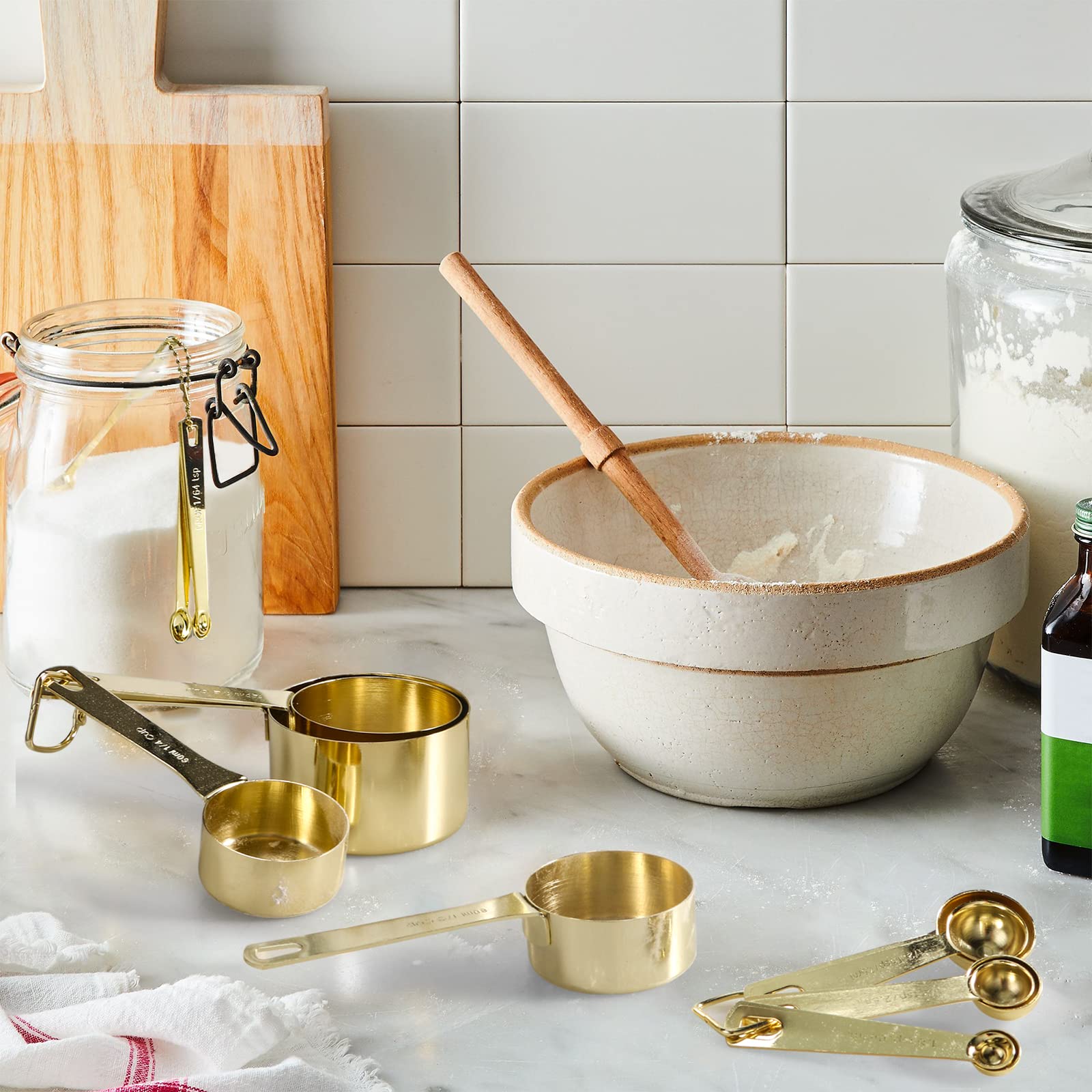 Esie Houzie heavy-duty spoons in gold finish for durable kitchen tools.