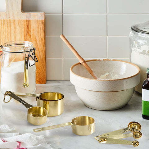 Esie Houzie heavy-duty spoons in gold finish for durable kitchen tools.
