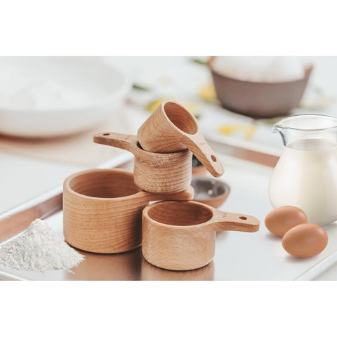 Esie Houzie leather tie accessory complements kitchen décor and keeps tools handy