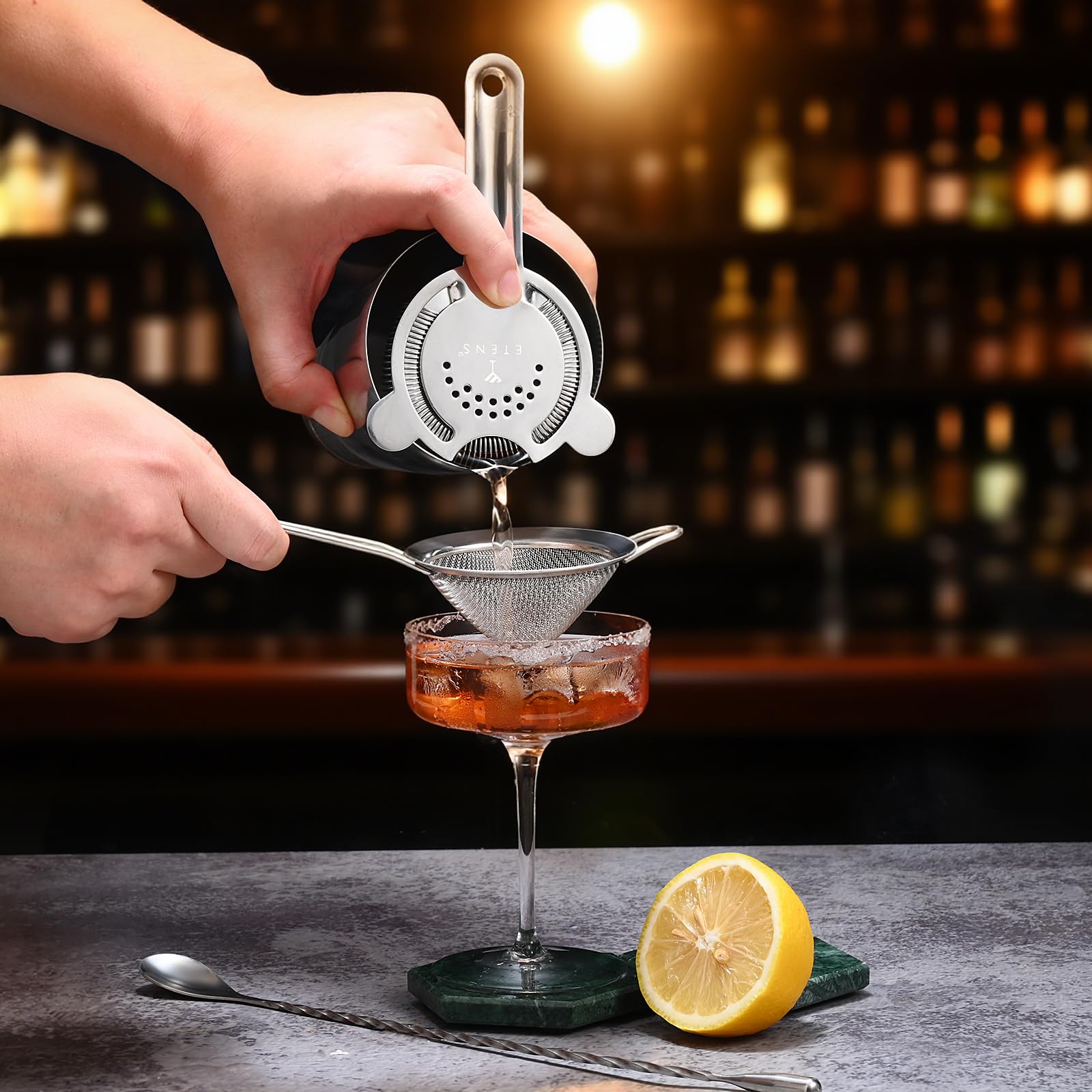 Etens fine mesh strainer filters ice pulp for clean cocktails.