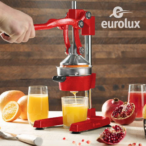 Eurolux citrus juicer pouring juice from the stainless cup